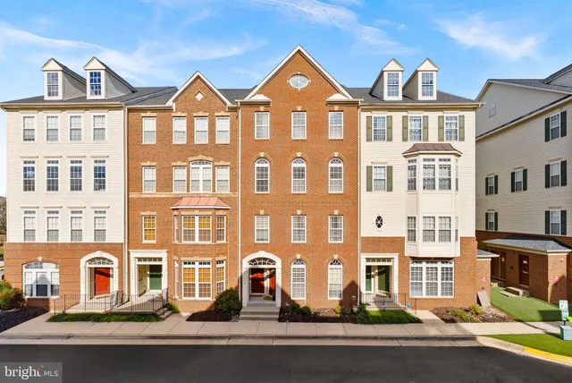 a front view of a building with street view