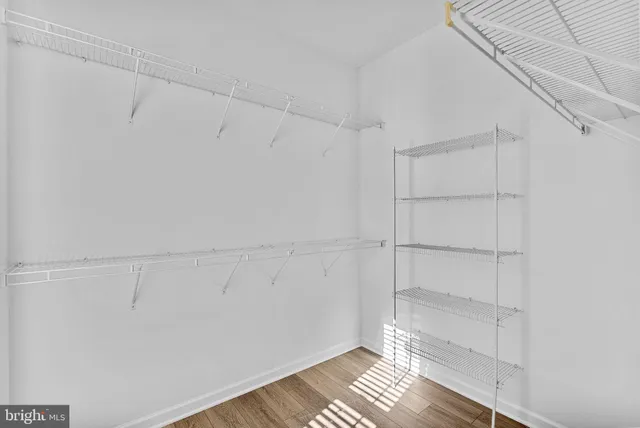 a view of an empty walk in closet