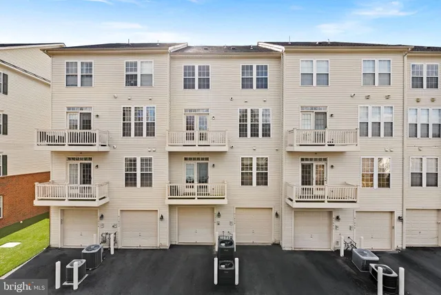 a large white building with a lot of windows