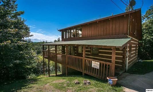 1758 Bluff Ridge Road Sevierville, TN 37876 - Photo 1 of 13 a view of a deck with a backyard