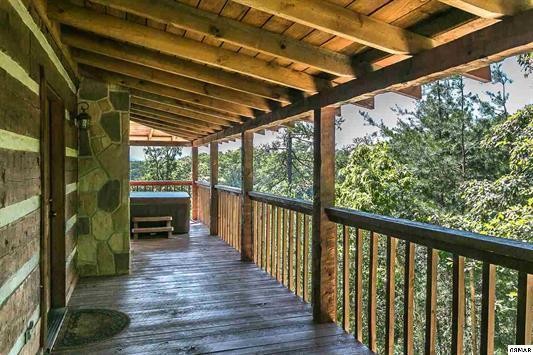 1758 Bluff Ridge Road Sevierville, TN 37876 - Photo 7 of 13 a view of a two chairs in the balcony