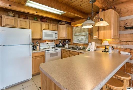 1758 Bluff Ridge Road Sevierville, TN 37876 - Photo 10 of 13 a kitchen with stainless steel appliances granite countertop a sink a stove and a refrigerator