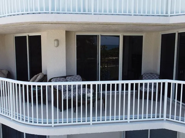 a view of a lake with a yard