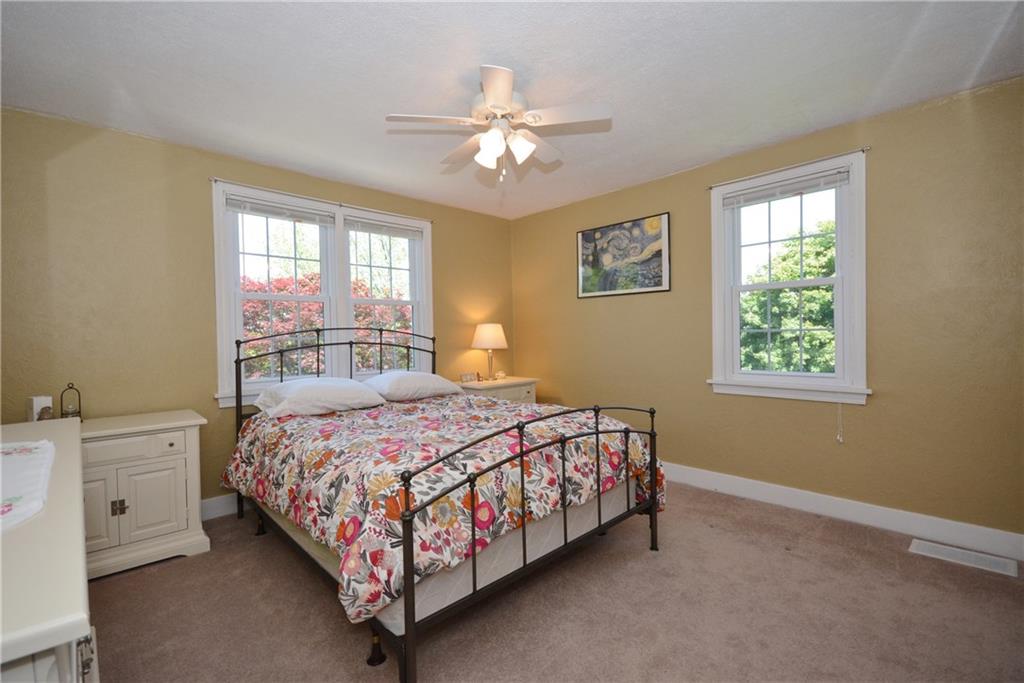 1329 Brinton Road Forest Hills, PA 15221 - Photo 18 of 24 Neutral paint colors and carpeting in the second bedroom