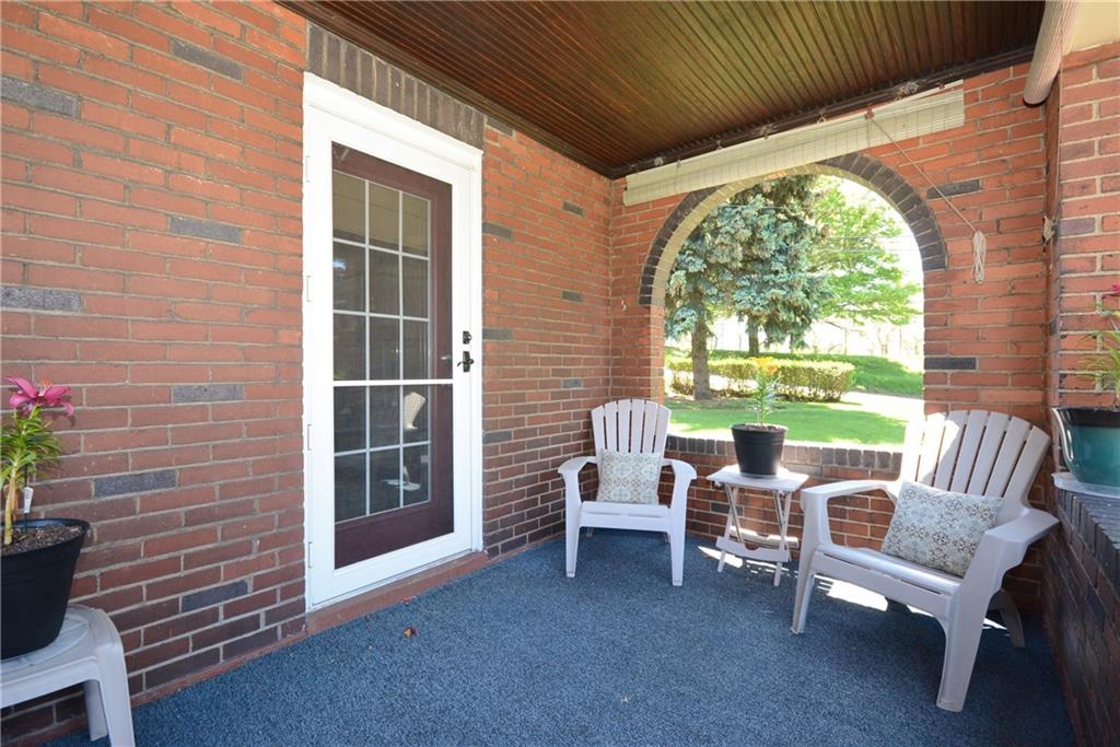 1329 Brinton Road Forest Hills, PA 15221 - Photo 3 of 24 The porch is off the living room.