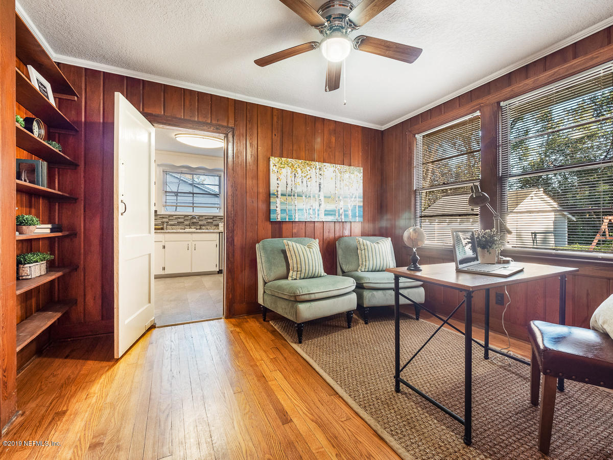 3981 Gadsden Road Jacksonville, FL 32207 - Photo 20 of 34 a living room with furniture and a large window