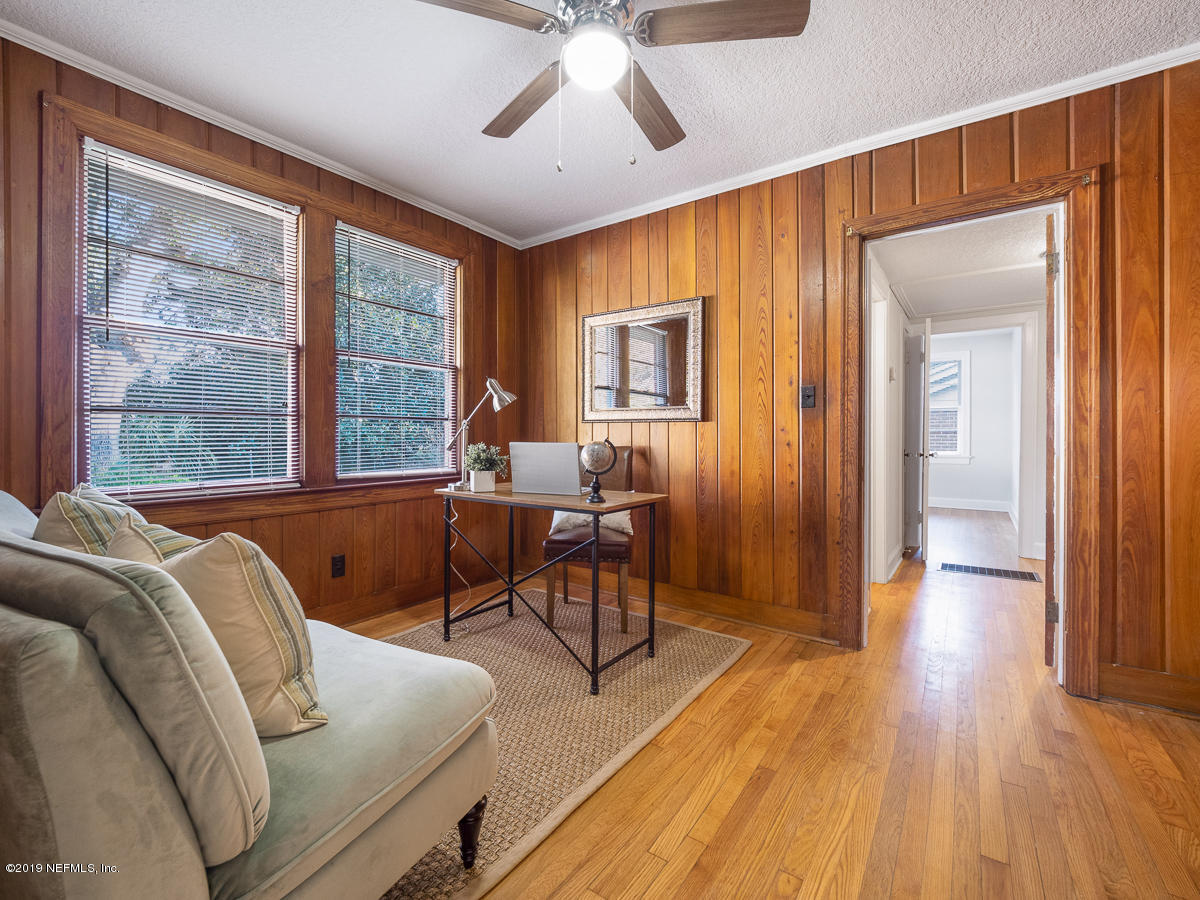 3981 Gadsden Road Jacksonville, FL 32207 - Photo 22 of 34 a living room with furniture and a large window