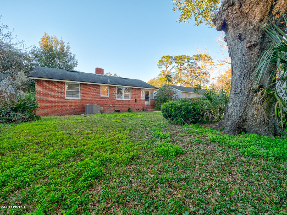 3981 Gadsden Road Jacksonville, FL 32207 - Photo 34 of 34 a view of a house with a yard