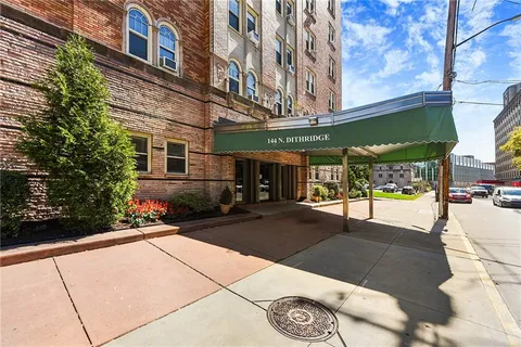 a view of a building with a patio