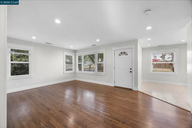 a view of livingroom with hardwood floor and window