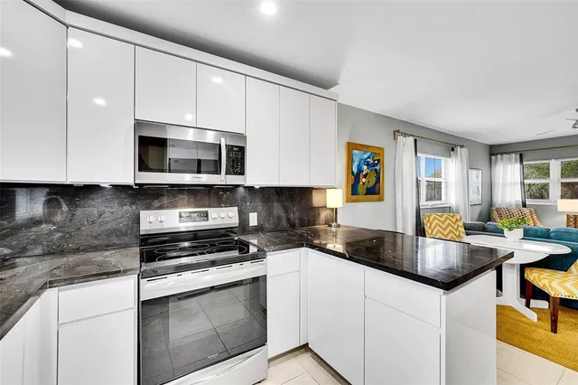 a kitchen view of a granite counter top