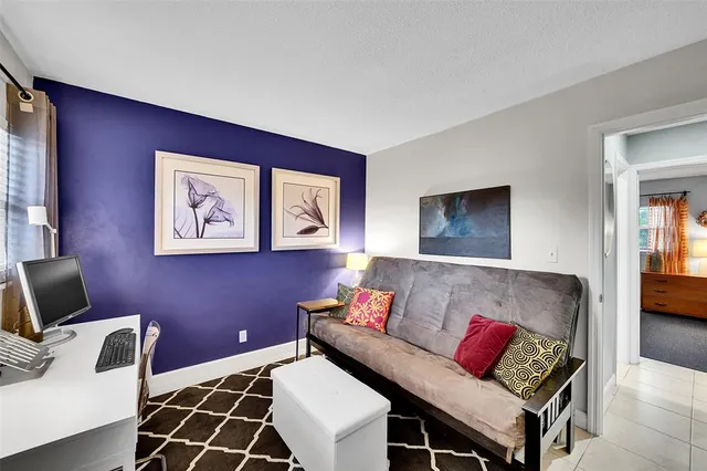 a view of a palm trees front of house