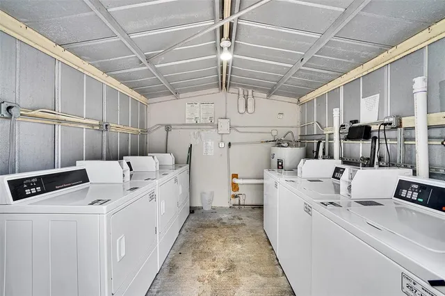 a view of multiple house with outdoor seating