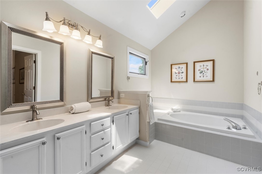 5814 Spinnaker Cove Road Midlothian, VA 23112 - Photo 25 of 46 featuring a skylight, garden tub, double vanity an