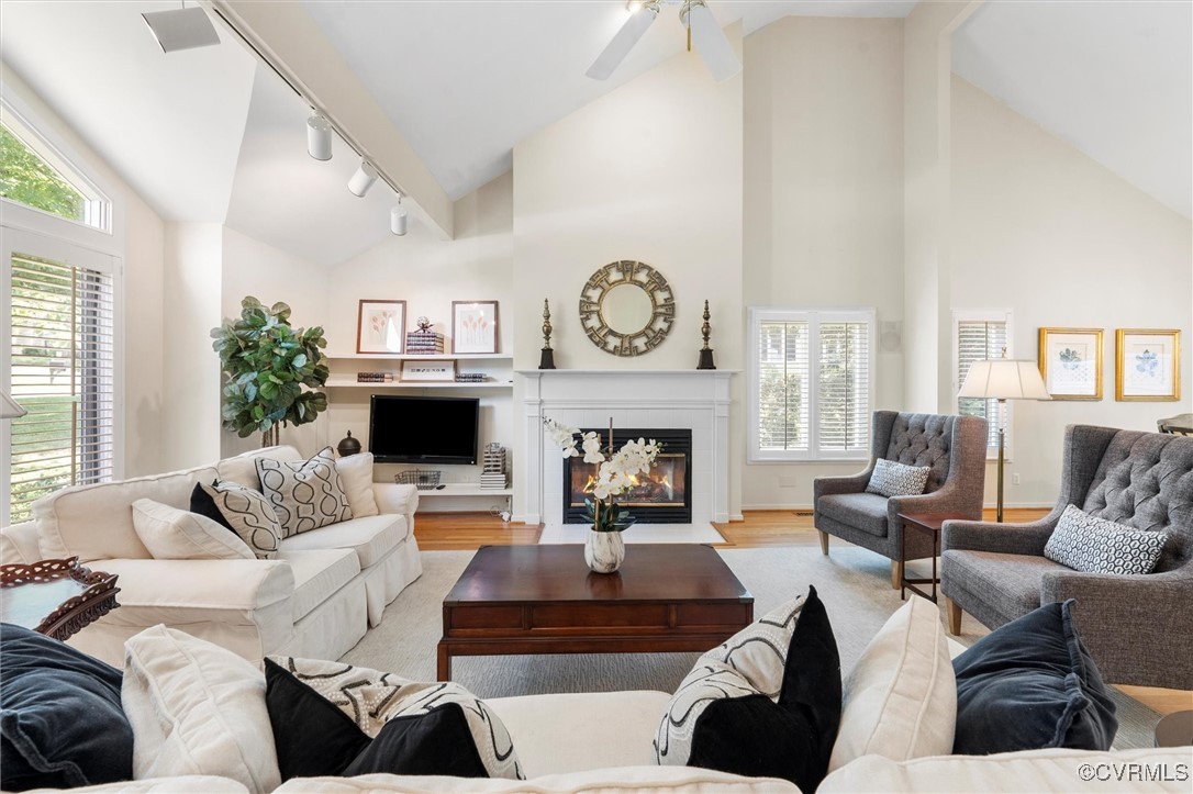 5814 Spinnaker Cove Road Midlothian, VA 23112 - Photo 8 of 46 featuring high vaulted ceiling, a gas fireplace an