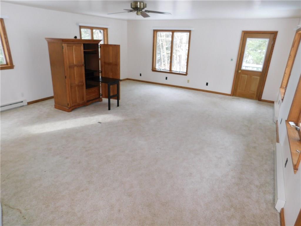 223 Tower Road Jamestown, PA 16134 - Photo 19 of 25 FAMILY ROOM LOCATED OFF KITCHEN ENJOY THE SOUND OF THE WATERFALL FROM THIS ROOM