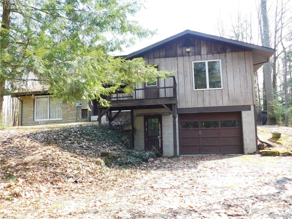 223 Tower Road Jamestown, PA 16134 - Photo 3 of 25 SIDE OF HOUSE HAS EXTRA GARAGE DOOR AND STORAGE