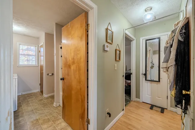 a view of a bathroom with a shower and a sink