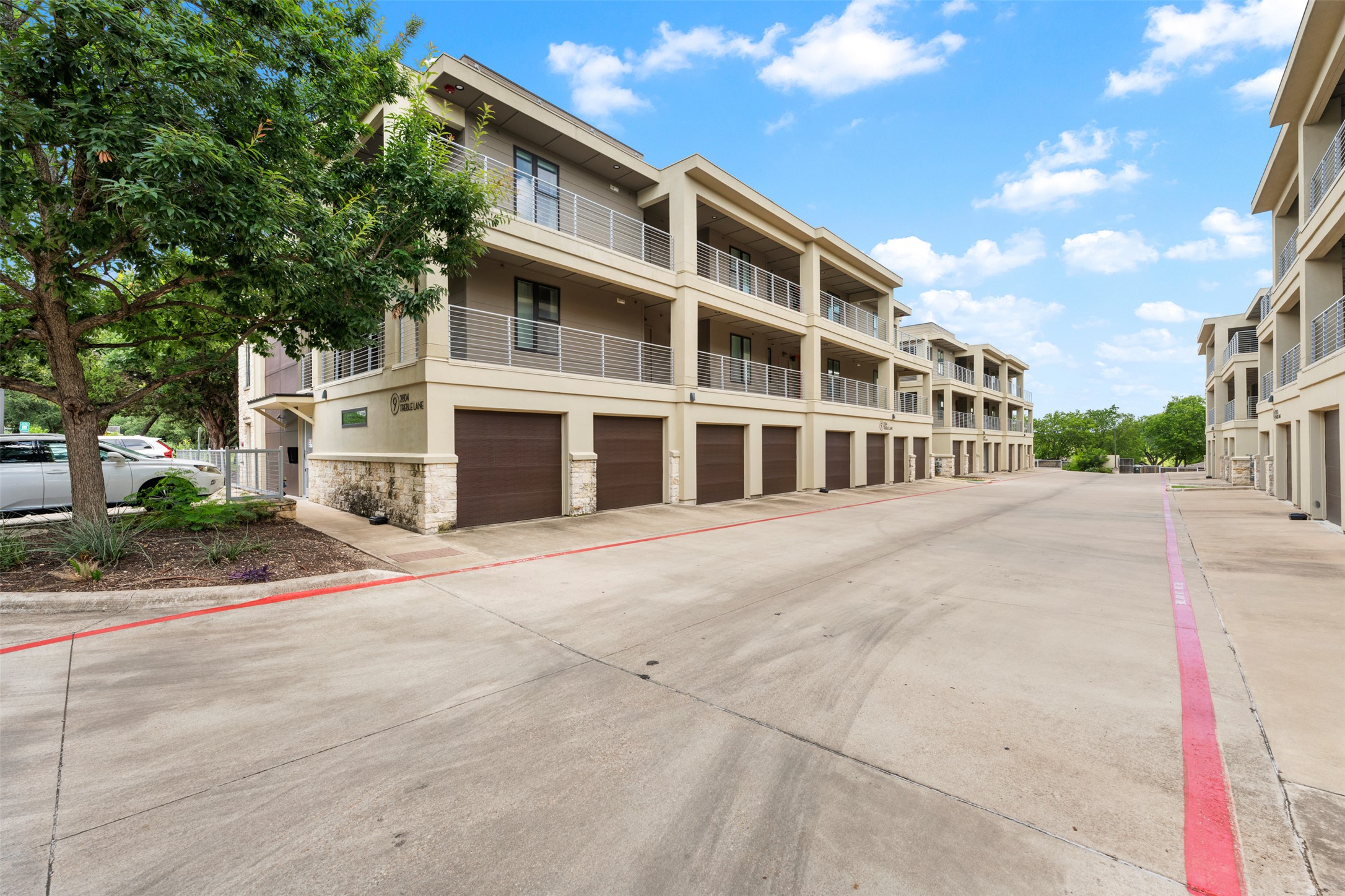 2804 Treble Lane, Unit 902 Austin, TX 78704 - Photo 4 of 31 a view of a building with a street