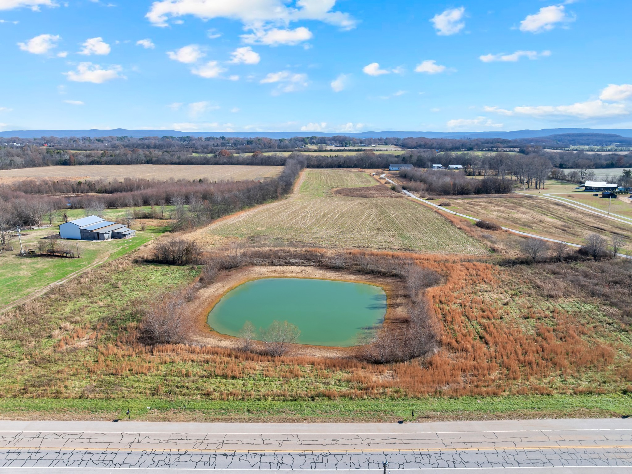 0 Rowe Gap Road Winchester, TN 37398 - Photo 4 of 28 a view of a swimming pool with an outdoor space and seating area