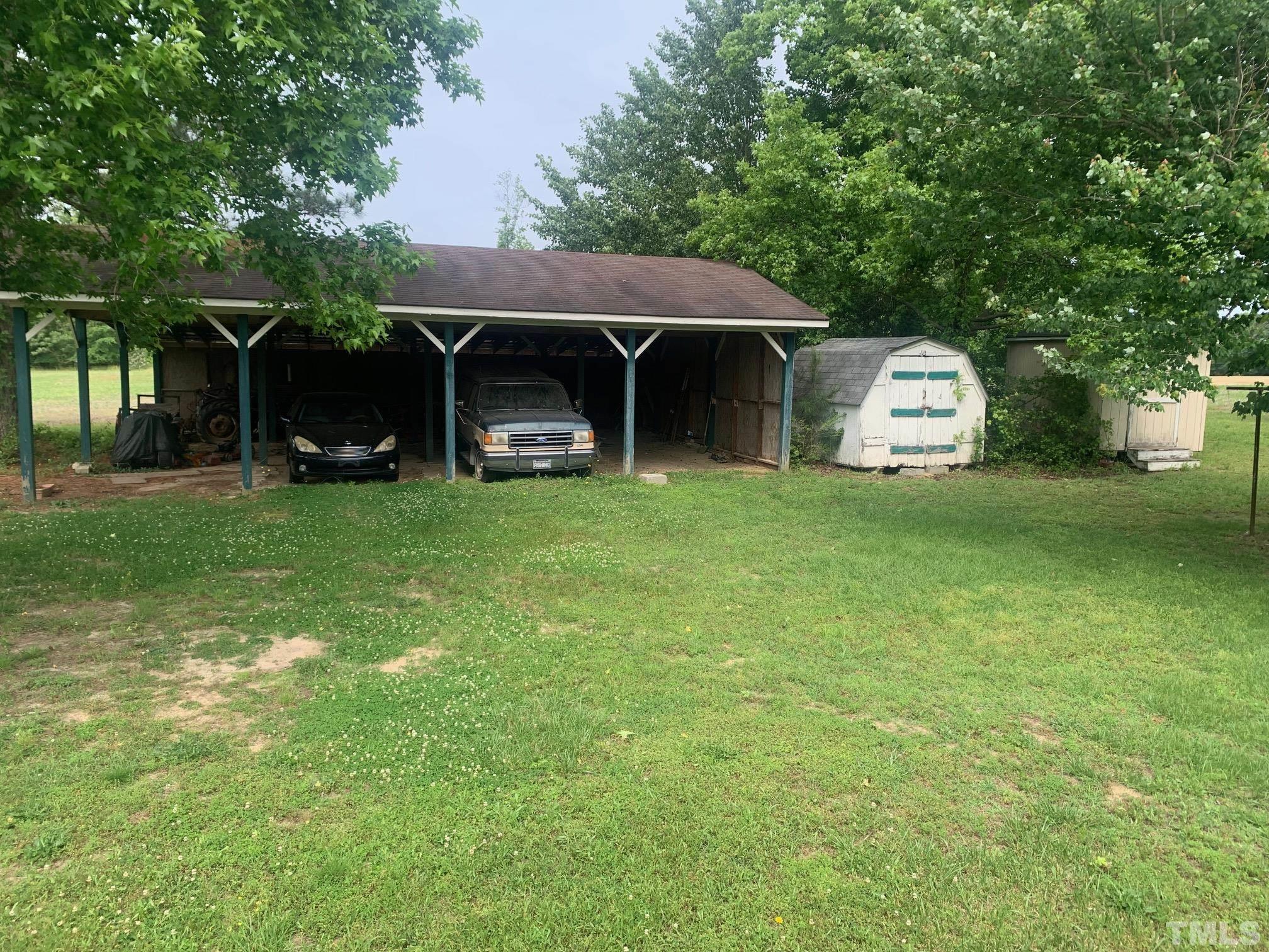 3125 Lizard Lick Road Wendell, NC 27591 - Photo 4 of 4 a view of a house with a yard