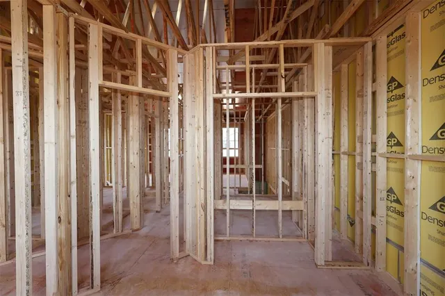 a view of a bathroom with a glass door shower