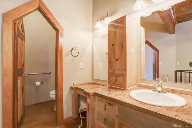 a bathroom with a double vanity sink mirror and double