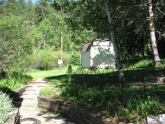 a view of a house with a garage