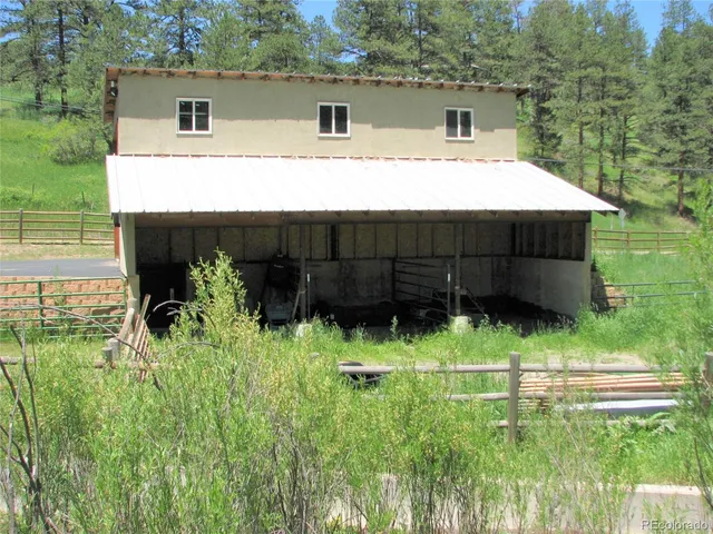 a view of a patio and yard