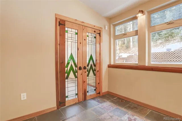 an empty room with windows