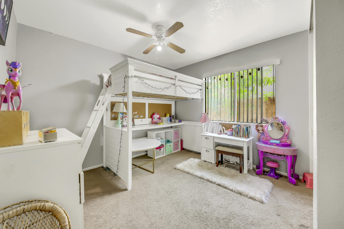 45535 Indian River Road Indio, CA 92201 - Photo 21 of 29 a bedroom with furniture and a window