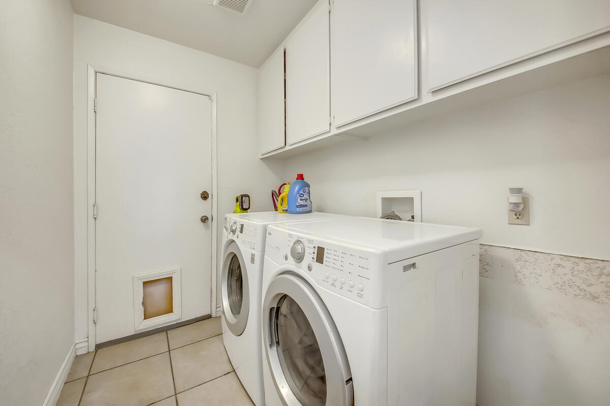 45535 Indian River Road Indio, CA 92201 - Photo 23 of 29 a utility room with dryer and washer