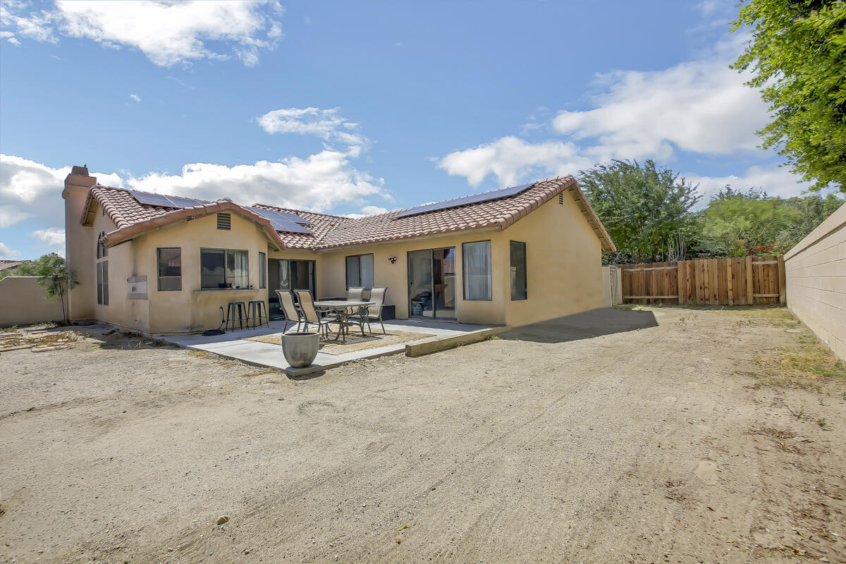 45535 Indian River Road Indio, CA 92201 - Photo 27 of 29 a view of a house with backyard and sitting area
