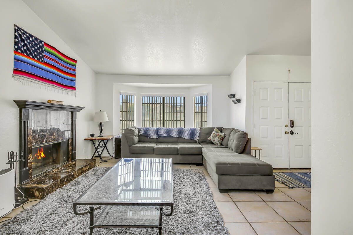 45535 Indian River Road Indio, CA 92201 - Photo 6 of 29 a living room with furniture and a fireplace