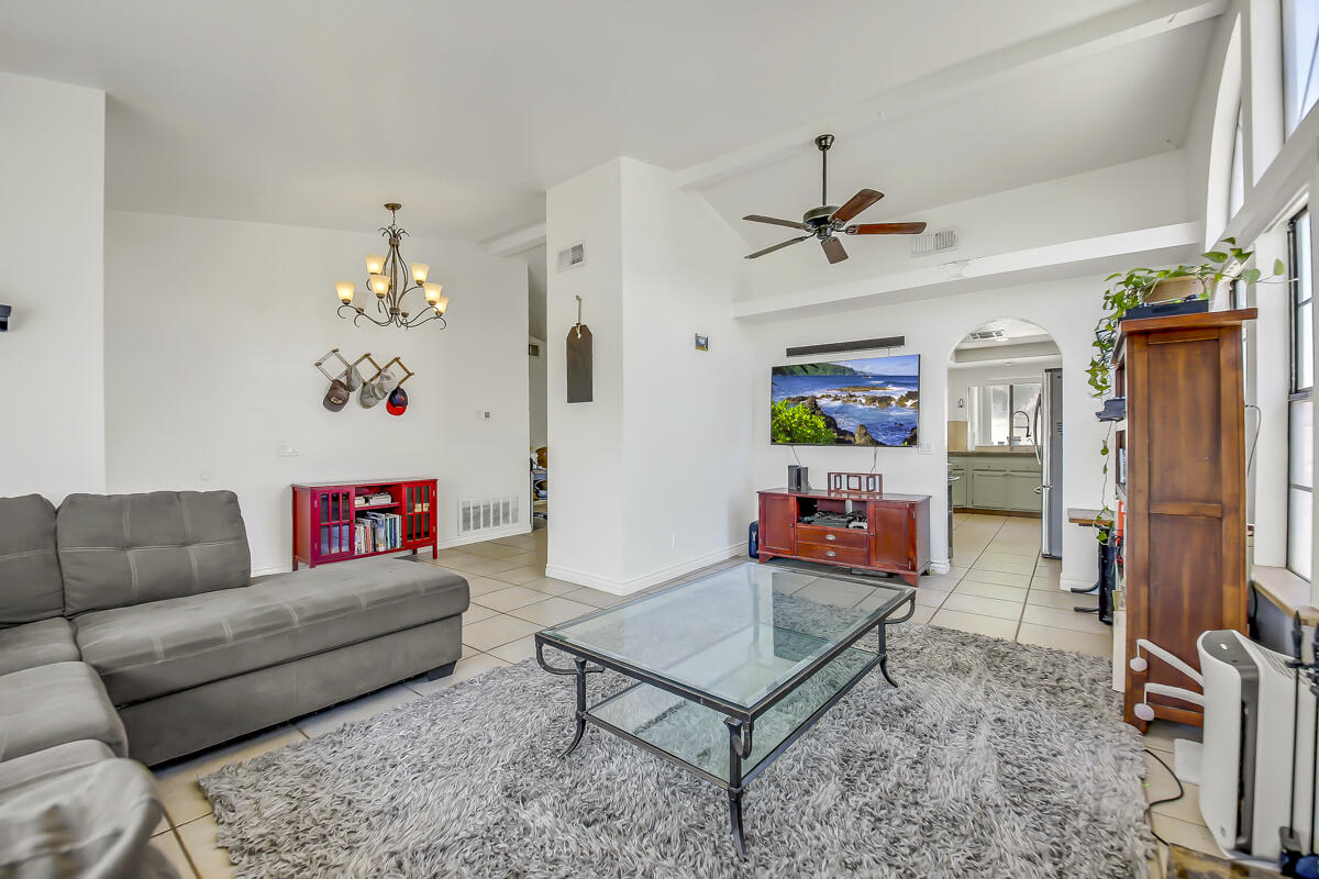 45535 Indian River Road Indio, CA 92201 - Photo 8 of 29 a living room with furniture and a rug