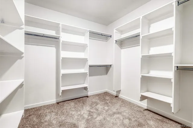 a view of an empty walk in closet
