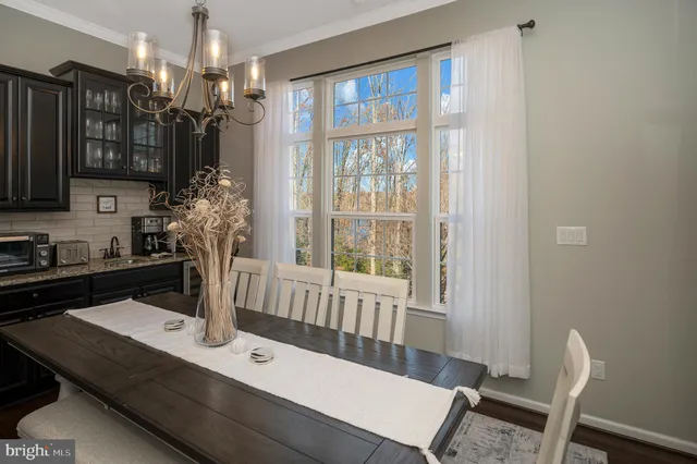 a view of a hallway view with staircase