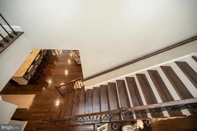 a view of an outdoor sitting area with brick walls