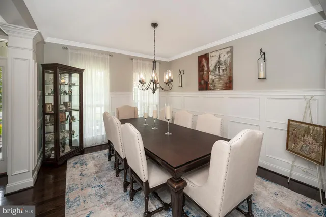 a living room with furniture fireplace and flat screen tv