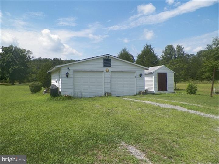 216 Magnolia Road Pemberton, NJ 08068 - Photo 22 of 24 a view of a backyard of the house