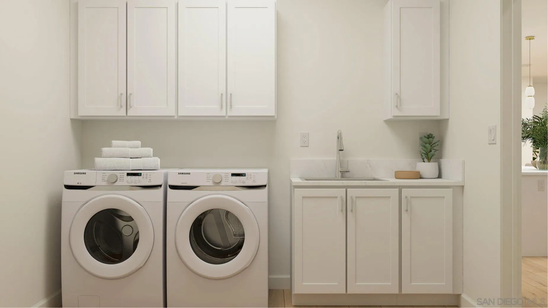290 Hadley Way Oceanside, CA 92057 - Photo 22 of 22 a utility room with dryer and washer