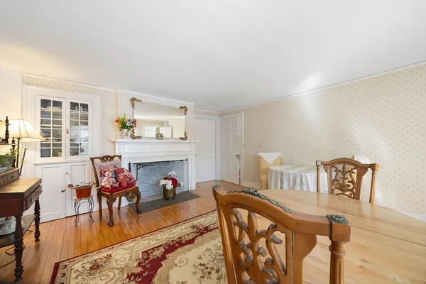 a view of a livingroom with furniture and a flat screen tv