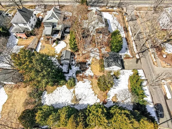 a view of houses covered with snow