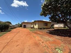4873 A Alii Road Hanapepe, HI 96716 - Photo 4 of 13 a view of a house with a yard