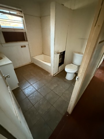 4873 A Alii Road Hanapepe, HI 96716 - Photo 9 of 13 a bathroom with a toilet and a sink