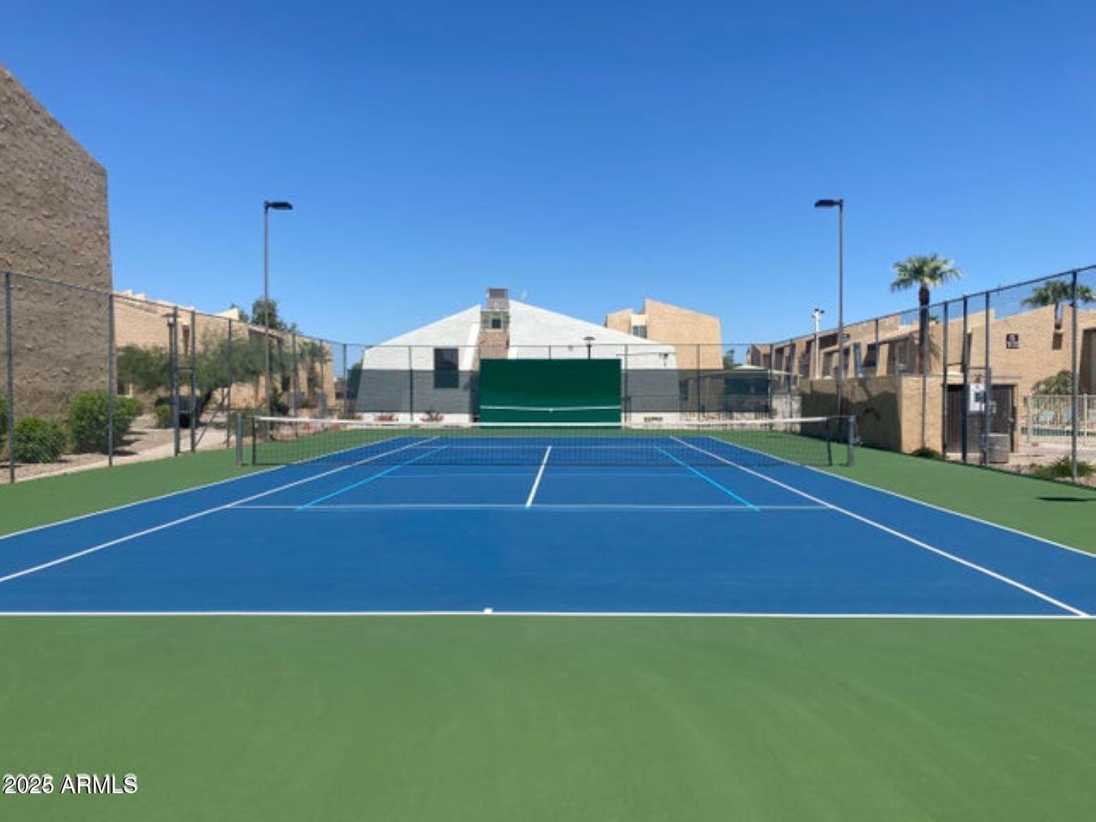 8055 East Thomas Road, Unit A303 Scottsdale, AZ 85251 - Photo 24 of 25 a view of a tennis court