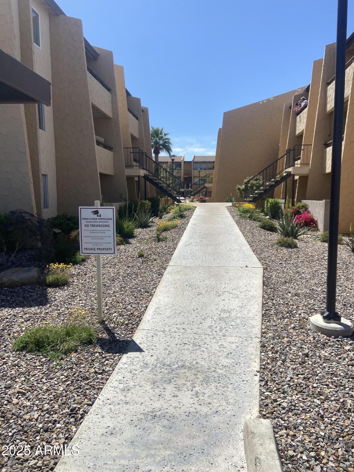 8055 East Thomas Road, Unit A303 Scottsdale, AZ 85251 - Photo 25 of 25 a view of a back yard of the house
