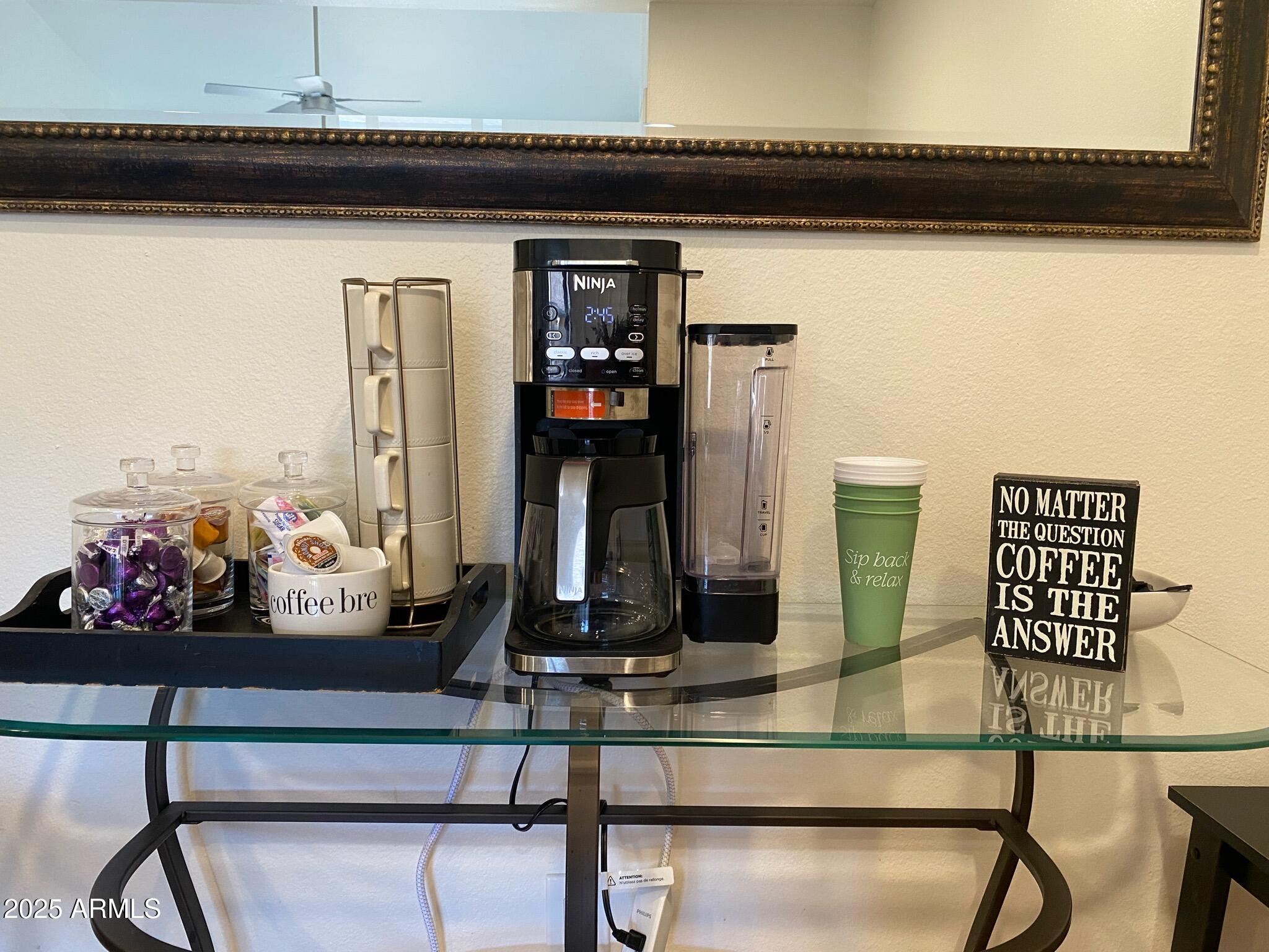 8055 East Thomas Road, Unit A303 Scottsdale, AZ 85251 - Photo 8 of 25 a view of a living room with furniture
