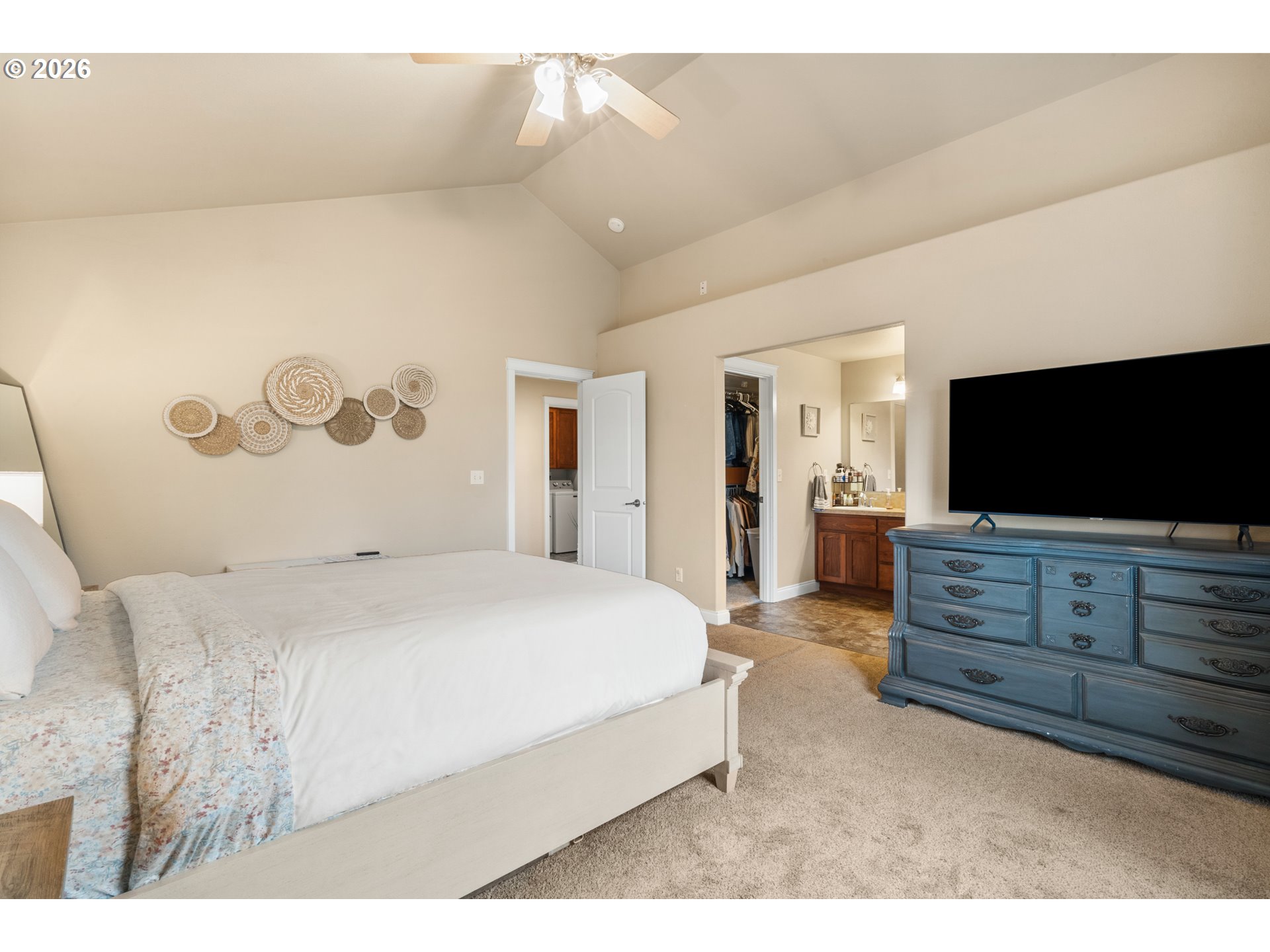 4971 Northeast Terri Lane Albany, OR 97321 - Photo 21 of 44 a spacious bedroom with a bed and a flat screen tv