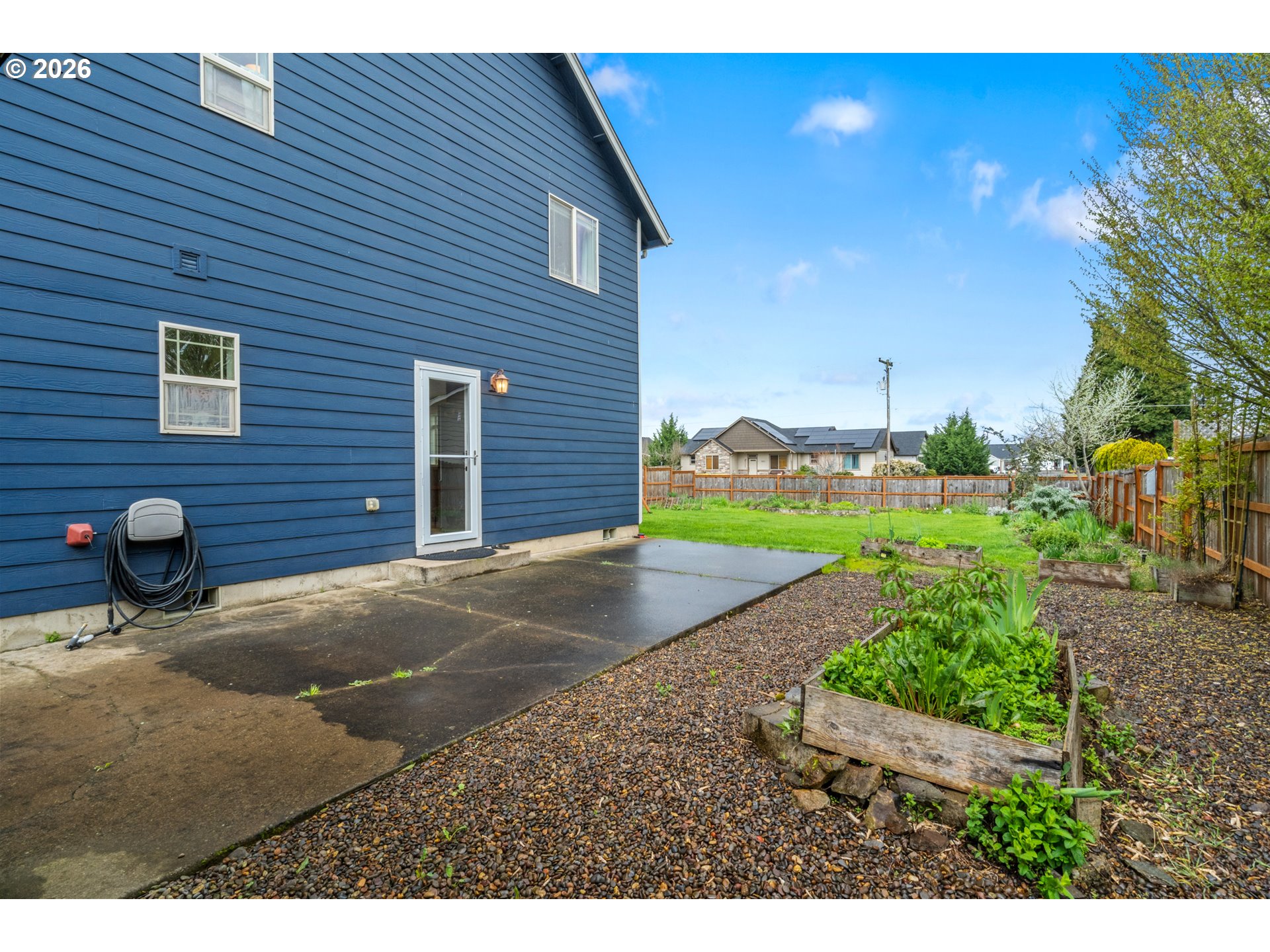 4971 Northeast Terri Lane Albany, OR 97321 - Photo 26 of 44 a backyard of a house with yard and outdoor seating